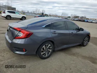 2017 Honda Civic EX with VIN 2HGFC2F87HH016523, listed as a Copart auction lot 53541115 with 156,221 mi miles and Salvage Title. Bid and sale history available at DreamBid. Image 3.