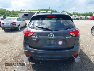 2015 Mazda CX-5 Touring with VIN JM3KE4CY9F0506879, listed as a IAAI auction lot 42209768 with 87,690 mi miles and . Bid and sale history available at DreamBid. Image 17.