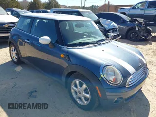2009 MINI Cooper Hardtop with VIN WMWMF33549TW79871, listed as a IAAI auction lot 41844591 with 236,255 mi miles. Bid and sale history available at carsss.com. Image 1.