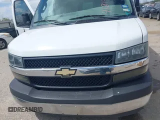 2018 Chevrolet Express Cargo Van with VIN 1GCWGAFG8J1906084, listed as a IAAI auction lot 41814922 with 162,977 mi miles. Bid and sale history available at carsss.com. Image 12.