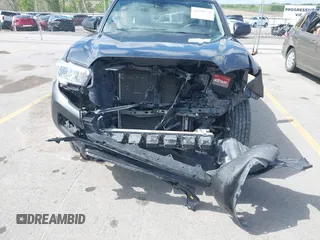 2019 Toyota Tacoma SR with VIN 5TFSX5EN4KX070181, listed as a IAAI auction lot 42318751 with 68,334 mi miles and . Bid and sale history available at DreamBid. Image 6.