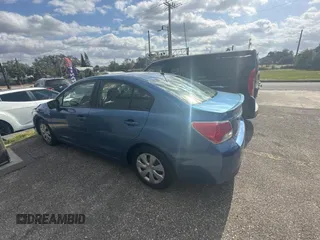 2016 Subaru Impreza z VIN JF1GJAA64GH004932, wystawiony jako Copart lot #87751265 z przebiegiem 99 587 mil mil oraz Czysty tytuł • Clean title. Historia ofert i sprzedaży dostępna na DreamBid. Obrazek 3.