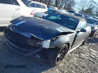 2021 Ford Mustang EcoBoost z VIN 1FATP8UH3M5105279, wystawiony jako IAAI lot #41712821 z przebiegiem 99 760 mil mil oraz . Historia ofert i sprzedaży dostępna na DreamBid. Obrazek 17.