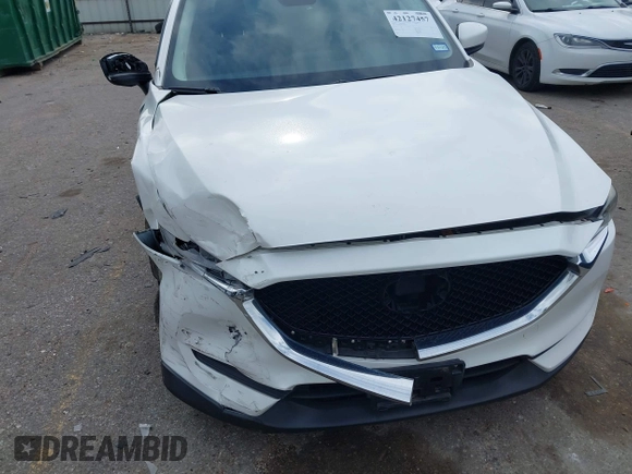 2020 Mazda CX-5 Touring z VIN JM3KFBCM2L0786784, wystawiony jako IAAI lot #42127457 z przebiegiem 62 665 mil mil oraz . Historia ofert i sprzedaży dostępna na DreamBid. Obrazek 6.