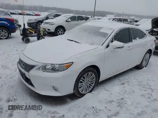 2015 Lexus ES with VIN JTHBK1GG1F2193282, listed as a IAAI auction lot 41238440 with 66,433 mi miles. Bid and sale history available at carsss.com. Image 2.