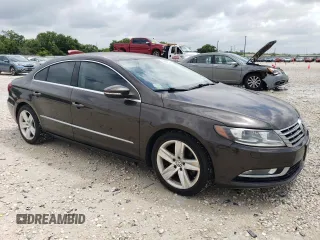 2014 Volkswagen CC R-Line with VIN WVWBN7ANXEE507477, listed as a Copart auction lot 58546374 with 73,792 mi miles and Salvage Title. Bid and sale history available at carsss.com. Image 4.