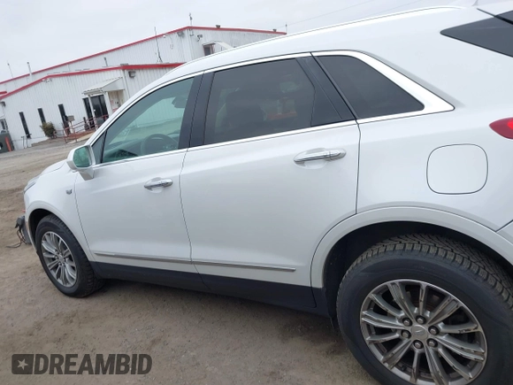 2017 Cadillac XT5 Luxury AWD with VIN 1GYKNDRS8HZ274425, listed as a IAAI auction lot 41170584 with 84,303 mi miles and . Bid and sale history available at carsss.com. Image 14.