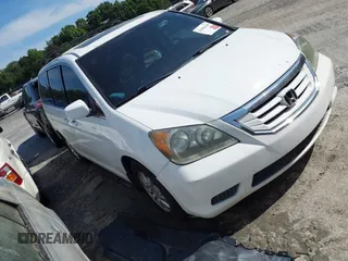 2009 Honda Odyssey EX-L with VIN 5FNRL38799B404379, listed as a IAAI auction lot 41990398 with 224,859 mi miles. Bid and sale history available at carsss.com. Image 1.