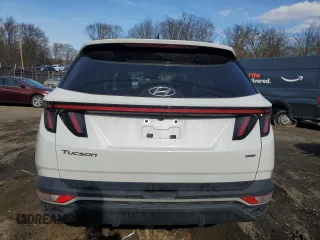 2022 Hyundai Tucson SEL with VIN 5NMJBCAE0NH027913, listed as a Copart auction lot 47072315 with 56,881 mi miles and Salvage Title. Bid and sale history available at carsss.com. Image 6.