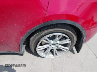 2023 Tesla Model Y Long Range z VIN 7SAYGAEE7PF691499, wystawiony jako IAAI lot #42038850 z przebiegiem 26 439 mil mil oraz . Historia ofert i sprzedaży dostępna na DreamBid. Obrazek 23.