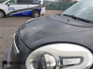 2014 FIAT 500L Easy with VIN ZFBCFABH7EZ028517, listed as a IAAI auction lot 41860321 with 79,665 mi miles and . Bid and sale history available at DreamBid. Image 6.