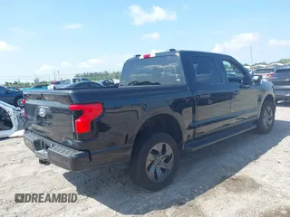 2024 Ford F-150 Lightning XLT with VIN 1FTVW3LK8RWG20320, listed as a IAAI auction lot 41960103 with Not provided miles and . Bid and sale history available at DreamBid. Image 4.