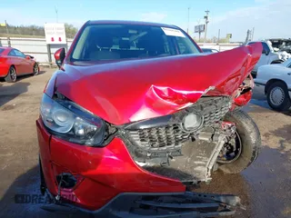 2015 Mazda CX-5 Sport z VIN JM3KE2BE7F0516869, wystawiony jako IAAI lot #41866488 z przebiegiem 131 237 mil mil oraz . Historia ofert i sprzedaży dostępna na DreamBid. Obrazek 12.