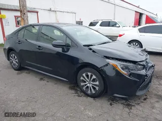 2022 Toyota Corolla Hybrid LE with VIN JTDEAMDE9NJ048100, listed as a IAAI auction lot 41746154 with 36,026 mi miles. Bid and sale history available at carsss.com. Image 1.