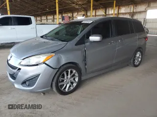 2012 Mazda 5 Touring z VIN JM1CW2CL8C0111851, wystawiony jako Copart lot #59232545 z przebiegiem 180 109 mil mil oraz Czysty tytuł • Clean title. Historia ofert i sprzedaży dostępna na DreamBid. Obrazek 1.
