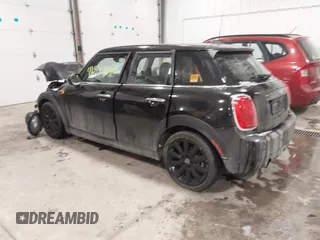 2017 MINI Hardtop 4 Door Cooper with VIN WMWXU1C34H2F78228, listed as a IAAI auction lot 41549060 with 49,393 mi miles. Bid and sale history available at carsss.com. Image 3.