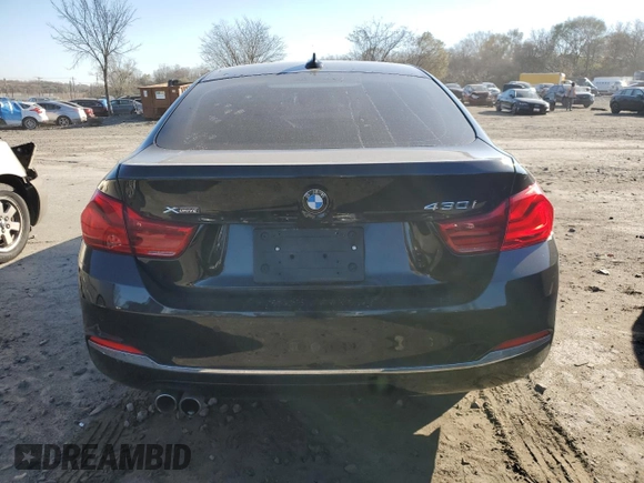 2019 BMW 4 Series 430i xDrive z VIN WBA4J3C58KBL06522, wystawiony jako Copart lot #82569834 z przebiegiem 112 562 mil mil oraz Szkoda całkowita • Salvage title. Historia ofert i sprzedaży dostępna na DreamBid. Obrazek 6.