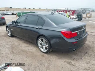 2011 BMW 7 Series 740Li with VIN WBAKB4C58BC574815, listed as a IAAI auction lot 42466704 with 155,292 mi miles and . Bid and sale history available at DreamBid. Image 3.