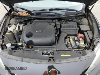 2016 Nissan Maxima SV z VIN 1N4AA6AP0GC397126, wystawiony jako Copart lot #56601695 z przebiegiem 103 990 mil mil oraz Szkoda całkowita • Salvage title. Historia ofert i sprzedaży dostępna na DreamBid. Obrazek 11.