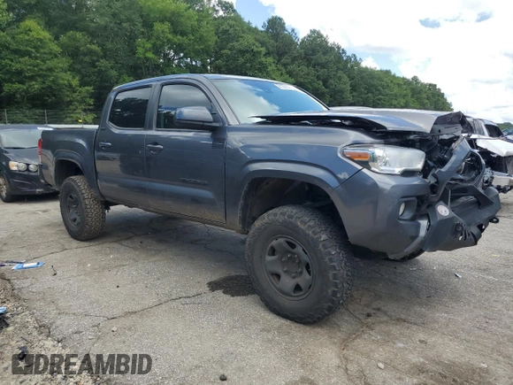 2022 Toyota Tacoma SR with VIN 3TYAX5GN2NT046114, listed as a Copart auction lot 61281875 with 57,726 mi miles and Salvage title. Bid and sale history available at DreamBid. Image 4.
