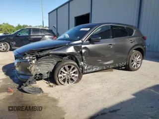 2021 Mazda CX-5 Grand Touring with VIN JM3KFBDM3M0467314, listed as a Copart auction lot 51820855 with 41,503 mi miles and Non Repairable. Bid and sale history available at DreamBid. Image 1.