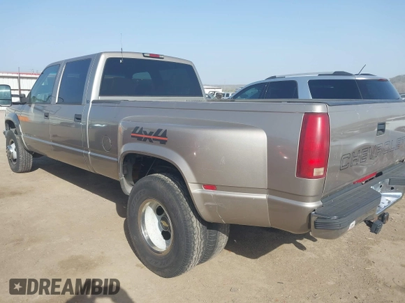 2000 Chevrolet Silverado 3500 z VIN 1GCHK33J0YF437640, wystawiony jako IAAI lot #41796214 z przebiegiem 139 411 mil mil oraz . Historia ofert i sprzedaży dostępna na DreamBid. Obrazek 3.
