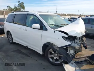 2014 Toyota Sienna SE with VIN 5TDXK3DC2ES472249, listed as a IAAI auction lot 41402101 with Not Provided miles. Bid and sale history available at carsss.com. Image 1.