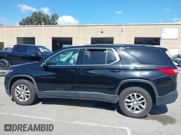 2021 Chevrolet Traverse LT Cloth with VIN 1GNERGKW9MJ162089, listed as a IAAI auction lot 41944248 with 99,586 mi miles. Bid and sale history available at carsss.com. Image 13.