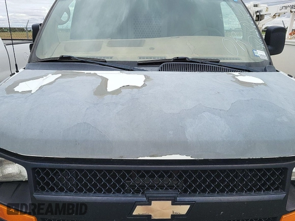 2010 Chevrolet Express Cargo with VIN 1GCZGFBA7A1166586, listed as a IAAI auction lot 42670844 with 161,614 mi miles and . Bid and sale history available at DreamBid. Image 2.