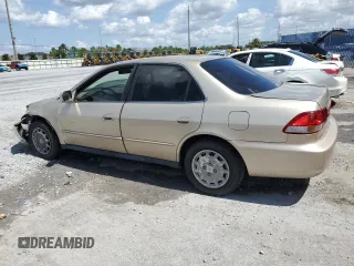 2001 Honda Accord LX z VIN JHMCG56401C022403, wystawiony jako Copart lot #60021165 z przebiegiem 119 114 mil mil oraz Szkoda całkowita • Salvage title. Historia ofert i sprzedaży dostępna na DreamBid. Obrazek 2.