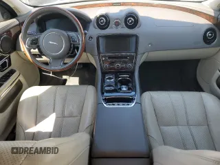 2014 Jaguar XJ with VIN SAJWA1CZ4E8V71167, listed as a Copart auction lot 43994545 with 69,682 mi miles and Salvage Title. Bid and sale history available at DreamBid. Image 8.