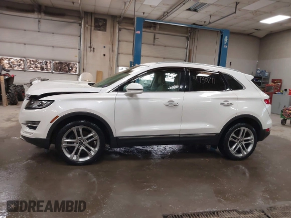 2019 Lincoln MKC Reserve with VIN 5LMCJ3D9XKUL17812, listed as a IAAI auction lot 41730211 with 56,716 mi miles and . Bid and sale history available at DreamBid. Image 15.