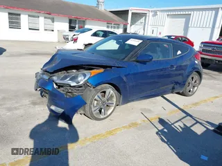 2016 Hyundai Veloster with VIN KMHTC6AD8GU302014, listed as a IAAI auction lot 41764406 with 102,893 mi miles. Bid and sale history available at carsss.com. Image 17.