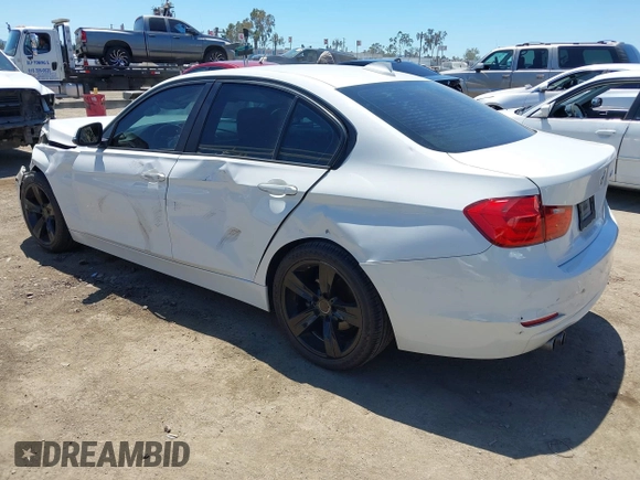 2014 BMW 3 Series 328i with VIN WBA3A5G55ENP31569, listed as a IAAI auction lot 42218428 with 151,927 mi miles and . Bid and sale history available at DreamBid. Image 3.