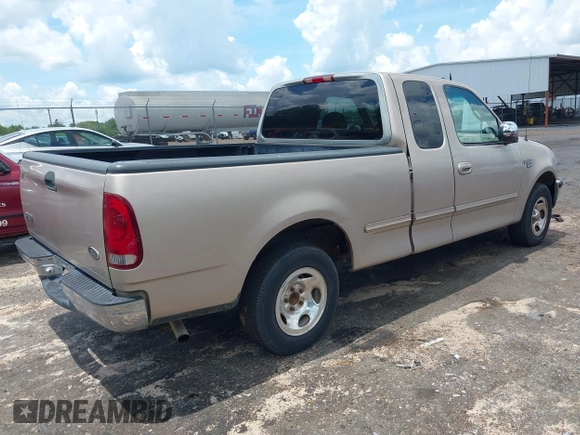 1998 Ford F-150 with VIN 1FTZX1760WNB21027, listed as a IAAI auction lot 42651506 with 189,442 mi miles and . Bid and sale history available at DreamBid. Image 4.