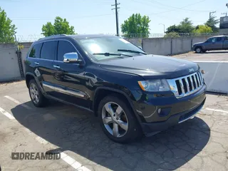 2011 Jeep Grand Cherokee Limited z VIN 1J4RR5GT3BC571648, wystawiony jako IAAI lot #42303061 z przebiegiem 168 352 mil mil oraz . Historia ofert i sprzedaży dostępna na DreamBid. Obrazek 1.