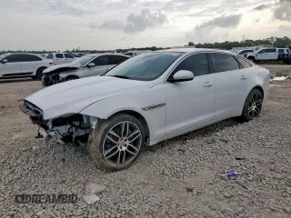 2015 Jaguar XJ Portfolio with VIN SAJWA2GZ3F8V86034, listed as a Copart auction lot 60227185 with 67,886 mi miles and Salvage title. Bid and sale history available at DreamBid. Image 1.