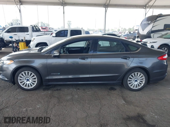 2015 Ford Fusion SE Hybrid with VIN 3FA6P0LU6FR309099, listed as a IAAI auction lot 42497429 with 157,631 mi miles and . Bid and sale history available at DreamBid. Image 14.