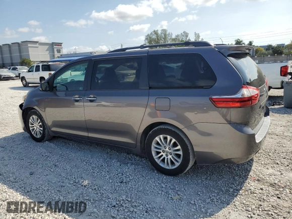 2015 Toyota Sienna XLE with VIN 5TDYK3DCXFS672544, listed as a Copart auction lot 52135735 with 181,780 mi miles and Salvage Title. Bid and sale history available at carsss.com. Image 2.