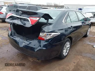 2015 Toyota Camry XLE with VIN 4T4BF1FK9FR450447, listed as a IAAI auction lot 41771512 with 218,691 mi miles and . Bid and sale history available at DreamBid. Image 4.
