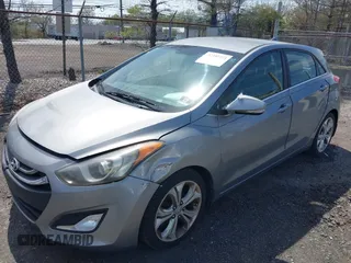 2014 Hyundai Elantra GT with VIN KMHD35LH8EU216052, listed as a IAAI auction lot 42102173 with 112,129 mi miles. Bid and sale history available at carsss.com. Image 6.