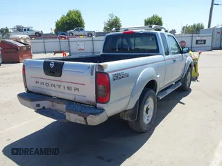 2001 Nissan Frontier SE Desert Runner z VIN 1N6ED26T51C362345, wystawiony jako IAAI lot #42324055 z przebiegiem 233 809 mil mil oraz . Historia ofert i sprzedaży dostępna na DreamBid. Obrazek 4.