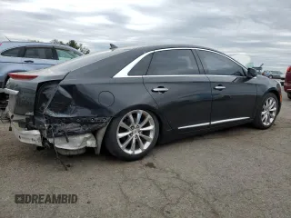 2013 Cadillac XTS Luxury z VIN 2G61R5S37D9127597, wystawiony jako Copart lot #53841755 z przebiegiem 81 603 mil mil oraz Szkoda całkowita • Salvage title. Historia ofert i sprzedaży dostępna na DreamBid. Obrazek 3.
