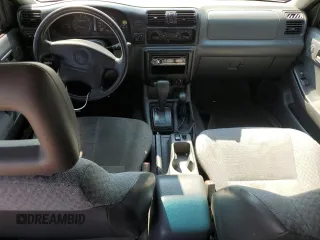 1999 Honda Passport LX с VIN 4S6CM58W9X4427075, выставлен на аукционе Copart как лот 65866554 с пробегом 227 454 миль миль и Списание • Salvage title. История ставок и продаж доступна на DreamBid. Изображение 8.