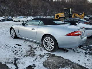 2010 Jaguar XK with VIN SAJWA4GB7ALB35518, listed as a Copart auction lot 86475814 with 32,910 mi miles and Salvage Title. Bid and sale history available at carsss.com. Image 2.