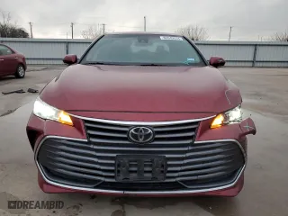 2022 Toyota Avalon XLE with VIN 4T1JZ1FB0NU076595, listed as a Copart auction lot 86649934 with 57,024 mi miles and Salvage Title. Bid and sale history available at carsss.com. Image 5.