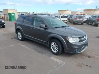 2014 Dodge Journey SXT with VIN 3C4PDCBGXET270510, listed as a IAAI auction lot 41861382 with 131,156 mi miles. Bid and sale history available at carsss.com. Image 1.