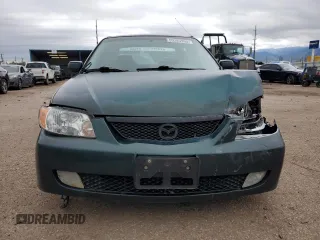 2002 Mazda Protege LX z VIN JM1BJ226920510014, wystawiony jako Copart lot #59285995 z przebiegiem 235 652 mil mil oraz Szkoda całkowita • Salvage title. Historia ofert i sprzedaży dostępna na DreamBid. Obrazek 5.