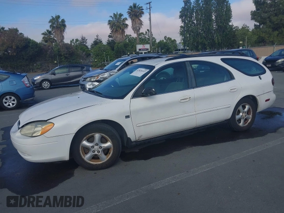 2003 Ford Taurus SE with VIN 1FAFP58SX3A245997, listed as a IAAI auction lot 42520332 with 140,937 mi miles and . Bid and sale history available at DreamBid. Image 2.