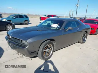 2012 Dodge Challenger SXT Plus with VIN 2C3CDYAG1CH262352, listed as a IAAI auction lot 41662002 with 141,868 mi miles. Bid and sale history available at carsss.com. Image 17.